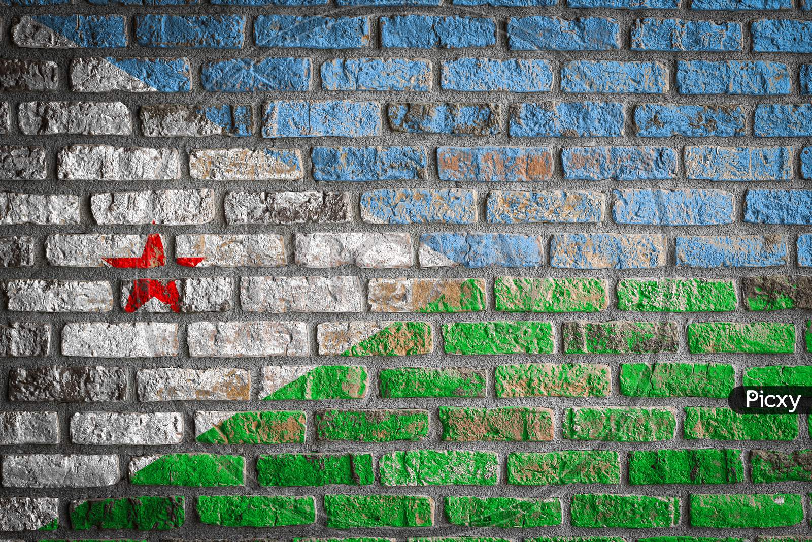 National Flag Of Djibouti
 Depicting In Paint Colors On An Old Brick Wall. Flag  Banner On Brick Wall Background.
