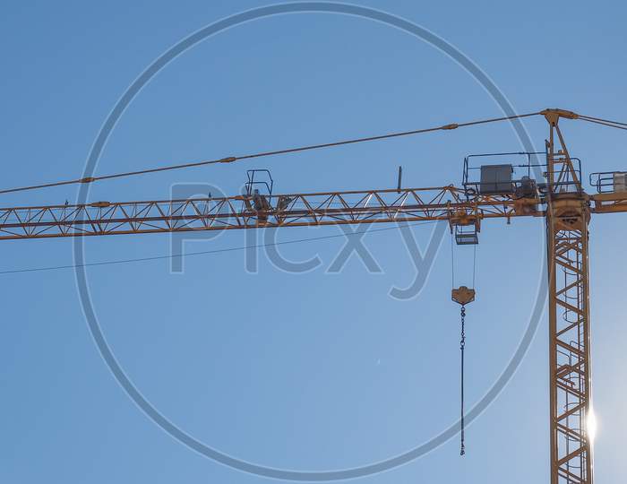 Construction Crane In Building Site