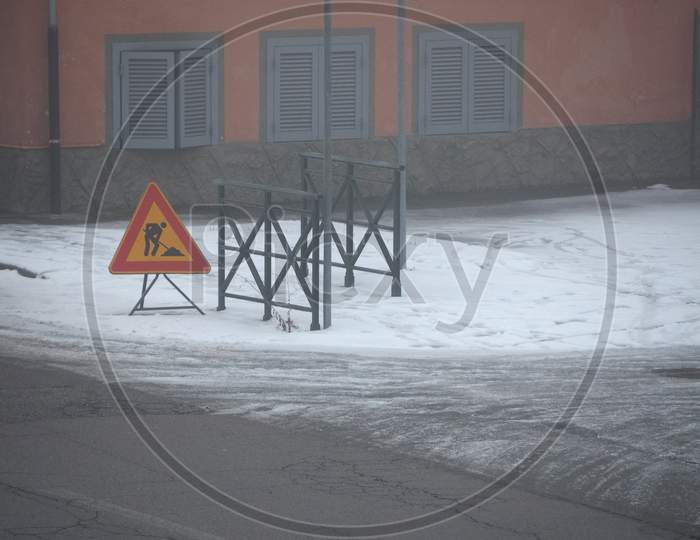 Road Works Sign In The Snow