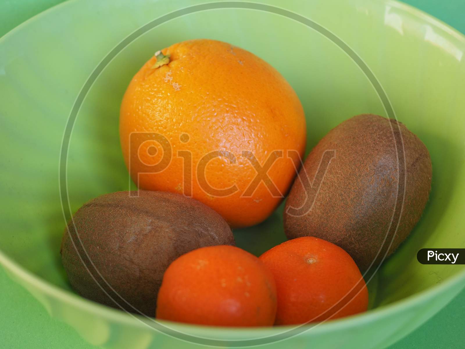 Fruits In Plastic Bowl