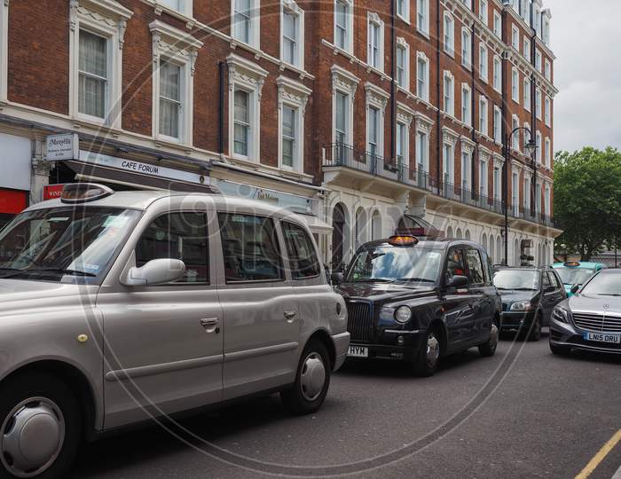 London, Uk - Circa June 2017: Taxi Cabs In The City Centre
