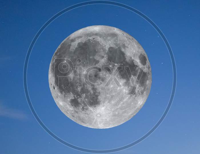Full Moon Over Blue Sky