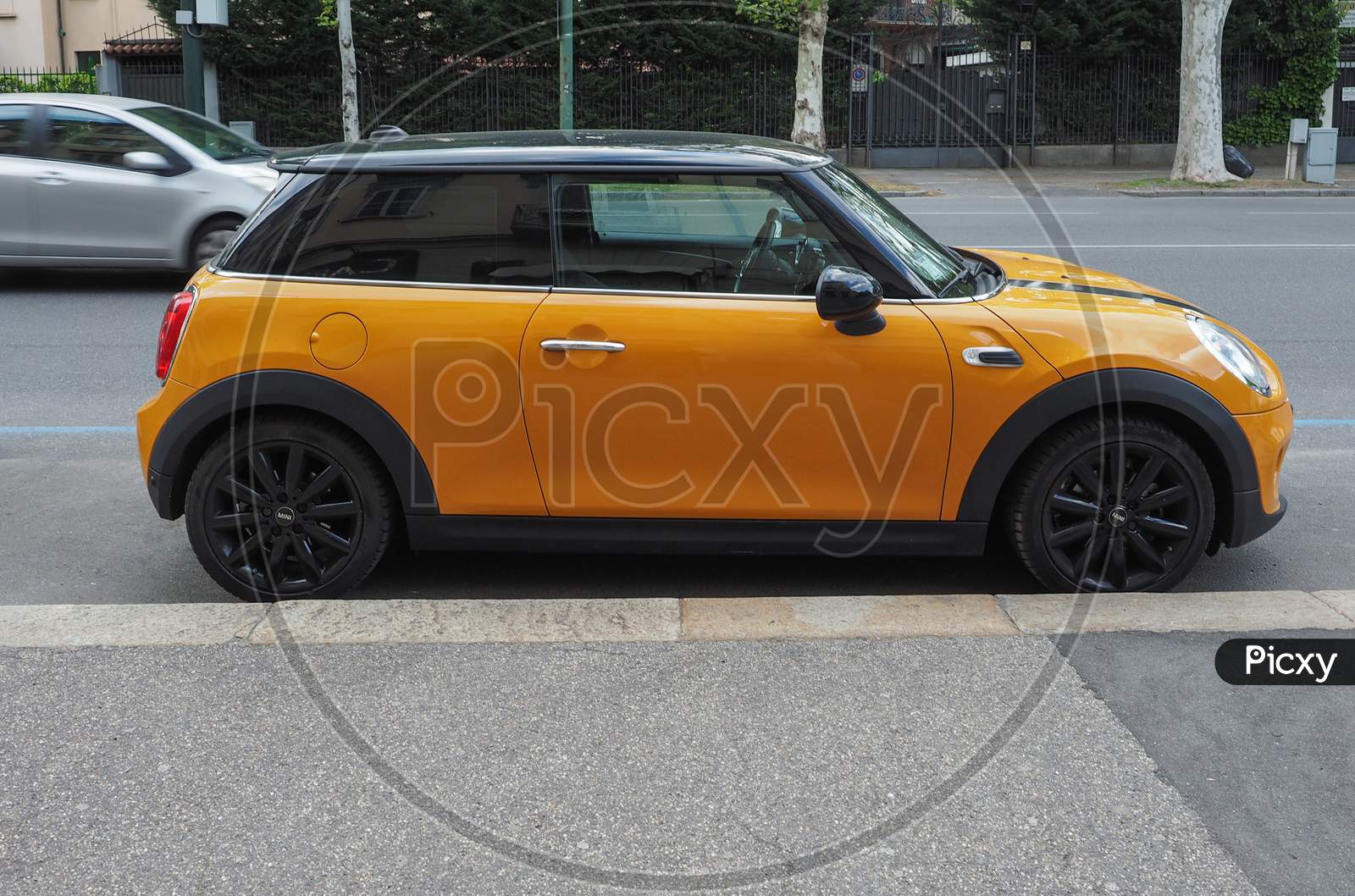 Turin, Italy - Circa May 2019: Yellow Mini Car