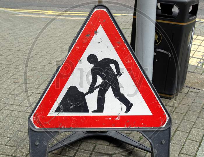 Roadworks Sign On The Pavement