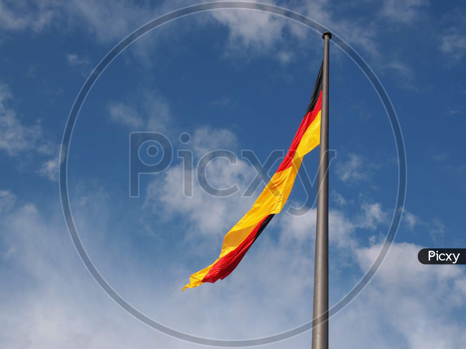 German Flag Over Blue Sky