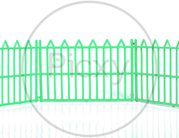 Green Plastic Fence Isolated Over White
