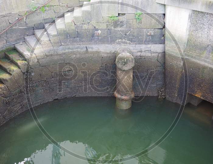 Water Well With Stone Stairs