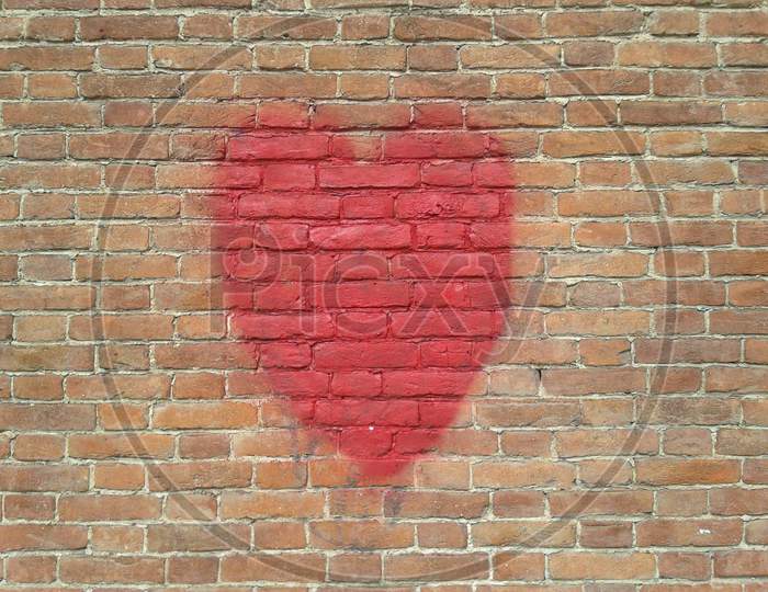 Red Heart On Wall With Copy Space
