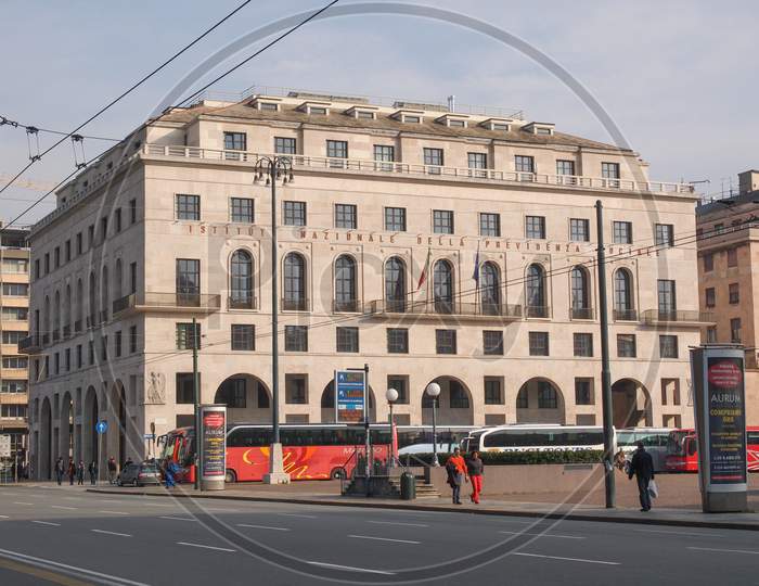 Genoa, Italy - March 16, 2014: The Palazzo Inps Palace Was Designed By Marcello Piacentini As Part Of Piazza Della Vittoria Square Redesign Between 1924 And 1937 In Rationalist Style
