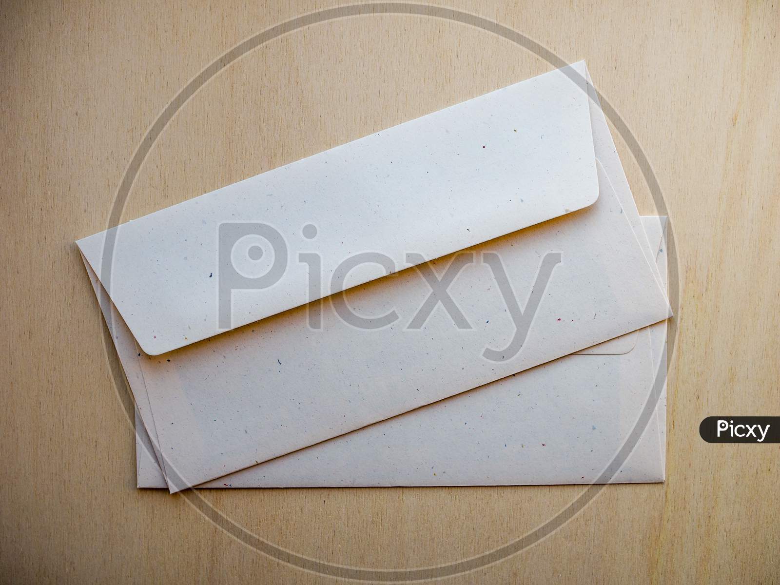 Letter Envelope On Wood Table
