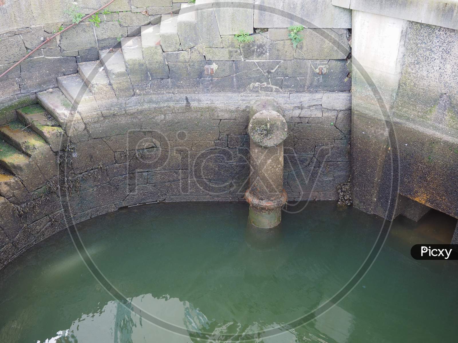Water Well With Stone Stairs