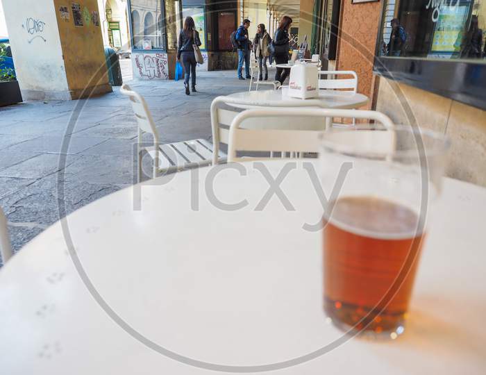 Turin, Italy - October 22, 2014: Pint Of British Ale On A Pub Table - Selective Focus On People In The Background
