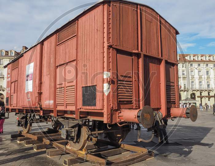 Turin, Italy - January 23, 2015: People Visiting An Holocaust Train For Deportation Of Jews To Concentration Forced Labour And Extermination Camps To Mark The Primo Levi Exhibition In Piazza Castello