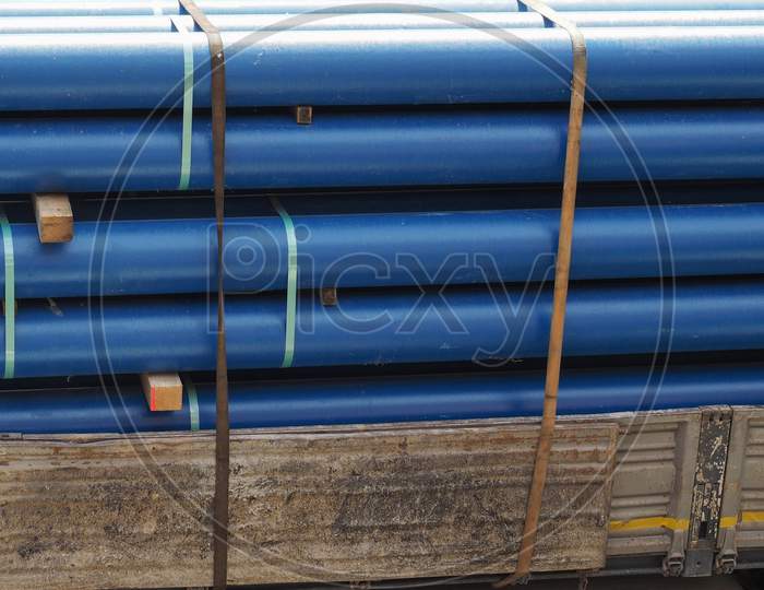 Blue Pipes On Lorry