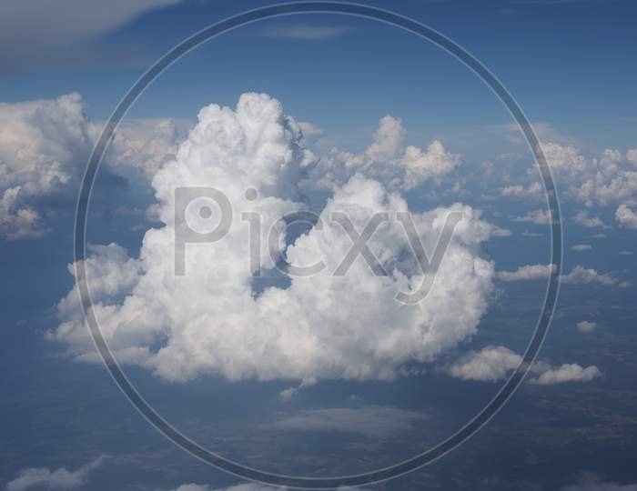 Blue Sky With Clouds Background Seen From Flying Plane