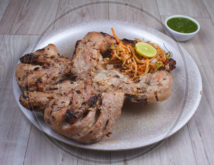 Malai Tandoori Chicken Is Chicken Dish Prepared By Roasting Chicken Marinated In Yoghurt And Spices In A Tandoor, A Cylindrical Clay Oven. It Is A Popular Dish From The Indian.