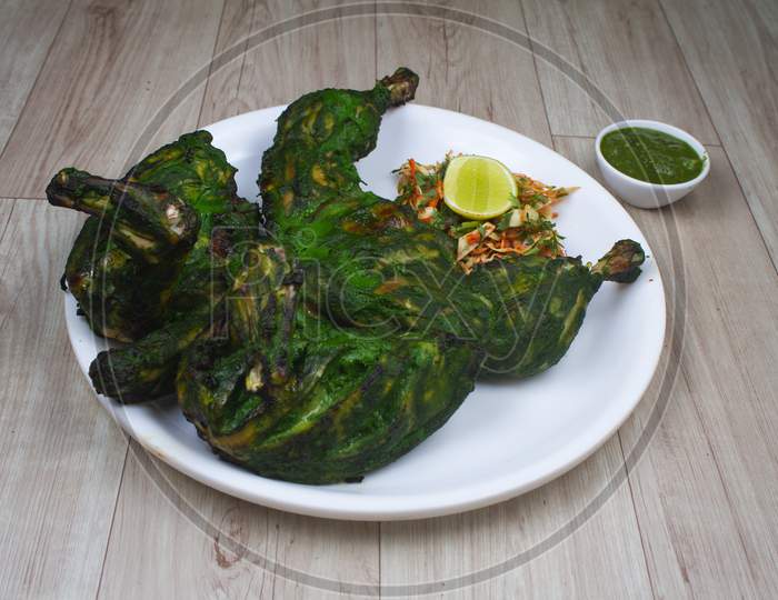 Green Tandoori Chicken Is Chicken Dish Prepared By Roasting Chicken Marinated In Yoghurt And Spices In A Tandoor, A Cylindrical Clay Oven. It Is A Popular Dish From The Indian.