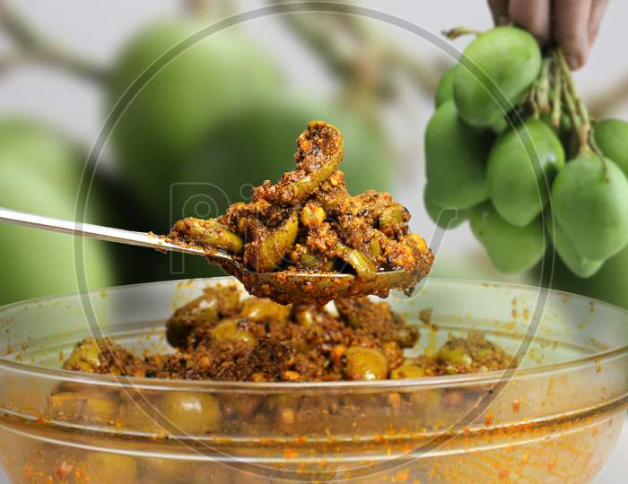 Hoemade raw mango pickle or aam ka aachar or kairi loncha.