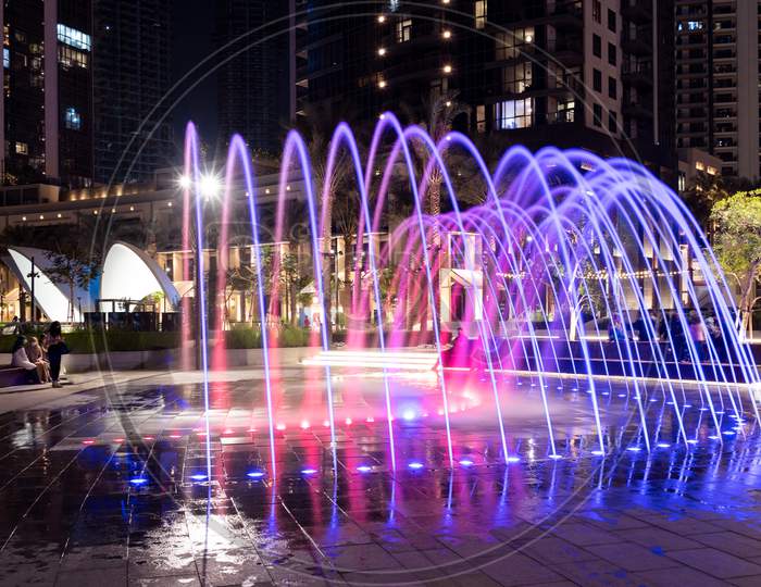 1St December 2020.Colorful Fountains At Dubai Creek Harbor With Embankment Promenade ,Hotels, Shops And Residences Captured In The Evening Time At The Dubai Creek Harbor, Ras Al Khor, Dubai , Uae.