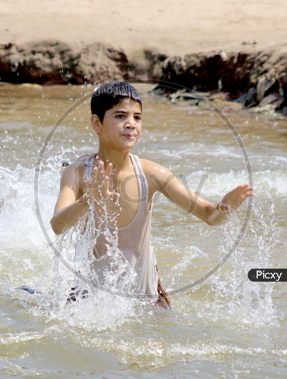 Kids Bathing In G-11 Sector Nullah Water To Protect Themselves From The Scorching Heat Of The Day.