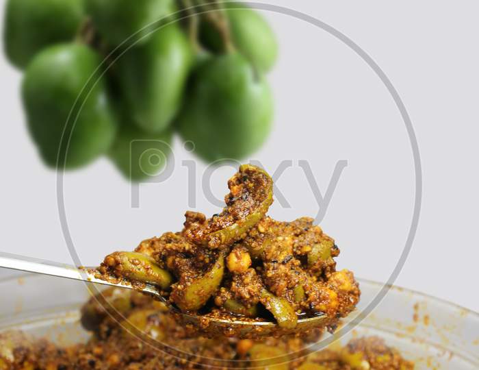 Hoemade raw mango pickle or aam ka aachar or kairi loncha.