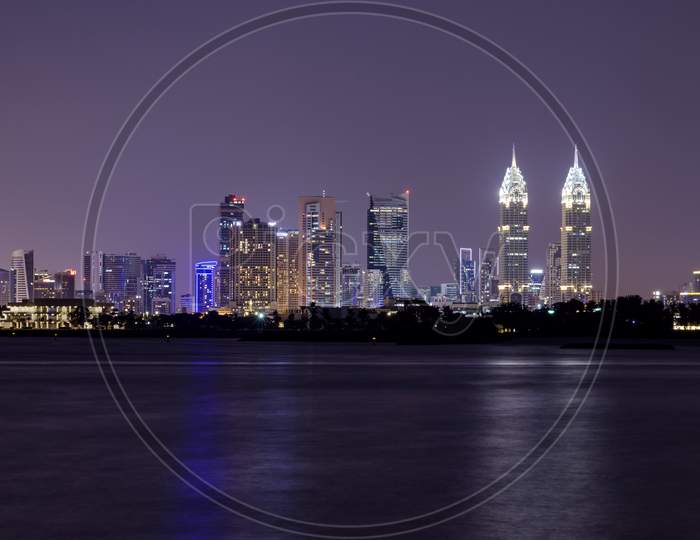 11 Dec 2020, Palm Jumeirah, Dubai.A Panoramic View Of The Illuminated Dubai Skyline With The Majestic Skyscrapper, Business Centers And Apartments Captured At The Palm Jumeirah East, Dubai , Uae.