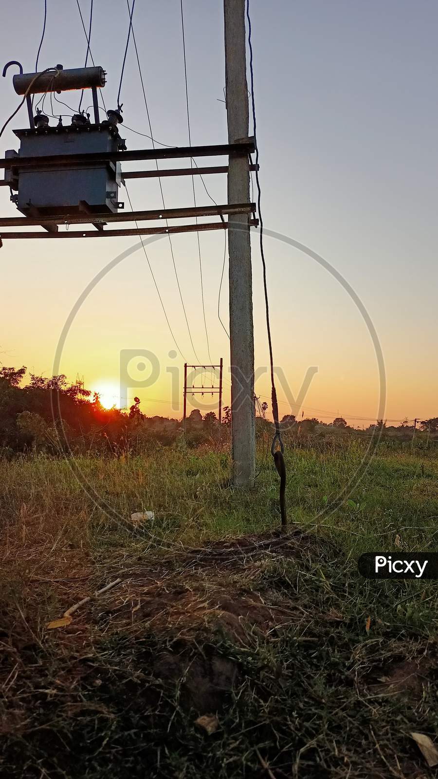 Sunset through Cables, India, Gujarat