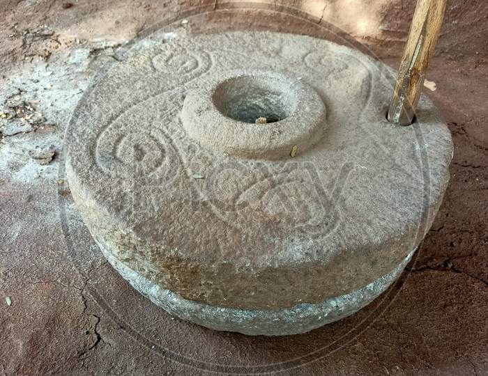 A traditional grinding stone for grain made of stone India, Gujarat