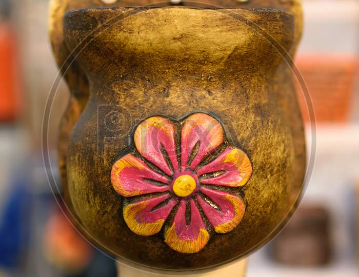 Beautiful Handmade Wall Hanging Flower Vase Is Displayed In A Shop For Sale In Blurred Background. Indian Handicraft