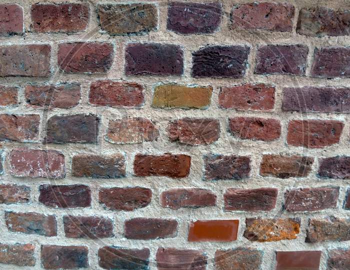 Colorful Brick And Stone Texture Background, Wawel Castle, Krakow In Poland, Europe.