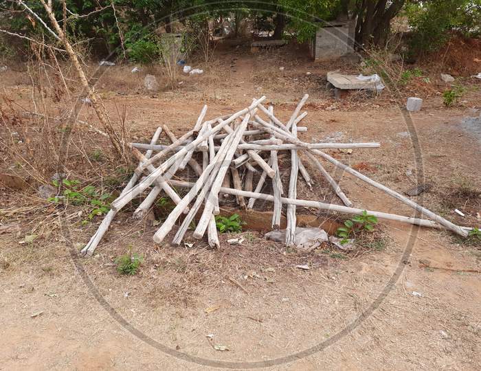 Closeup and group of building construction material wooden long sticks