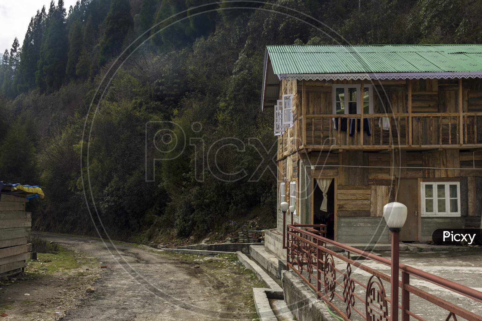A Road Side Wooden House At Lachung Village Of North Sikkim.
