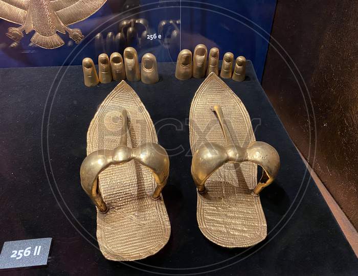 Golden Sandals And Treasures From Tomb Of Tutankhamun.