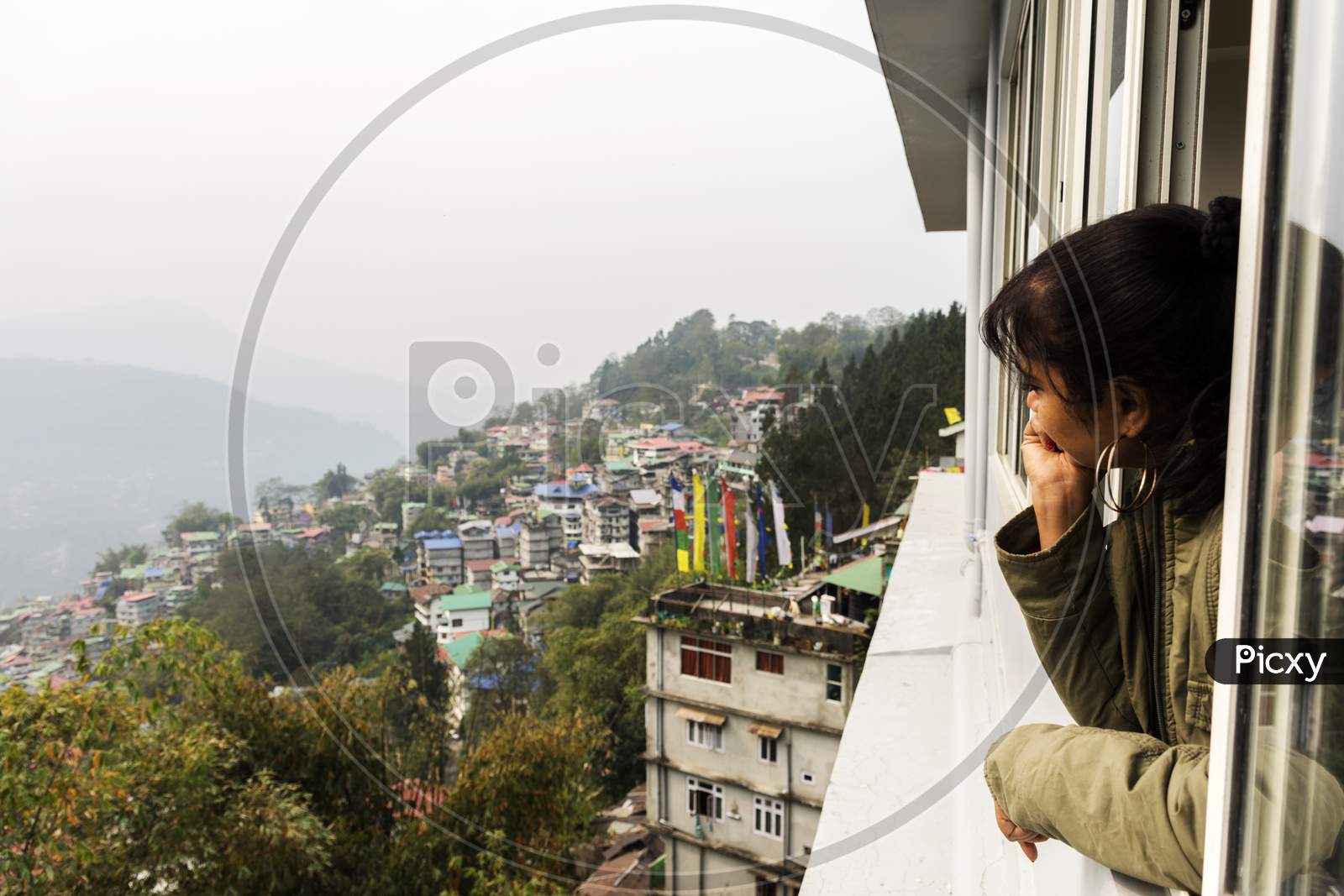 A Young Female Tourist Enjoying The View Of Beautiful Gangtok The Capital City Of Sikkim.