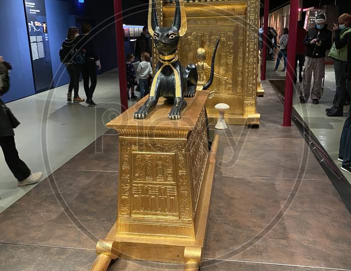 Tomb And Treasures With Golden Cow And Black Anubis As Replicas From Egypt Pharaoh Tutankhamun. 14.03.2021 - Oerlikon, Switzerland.