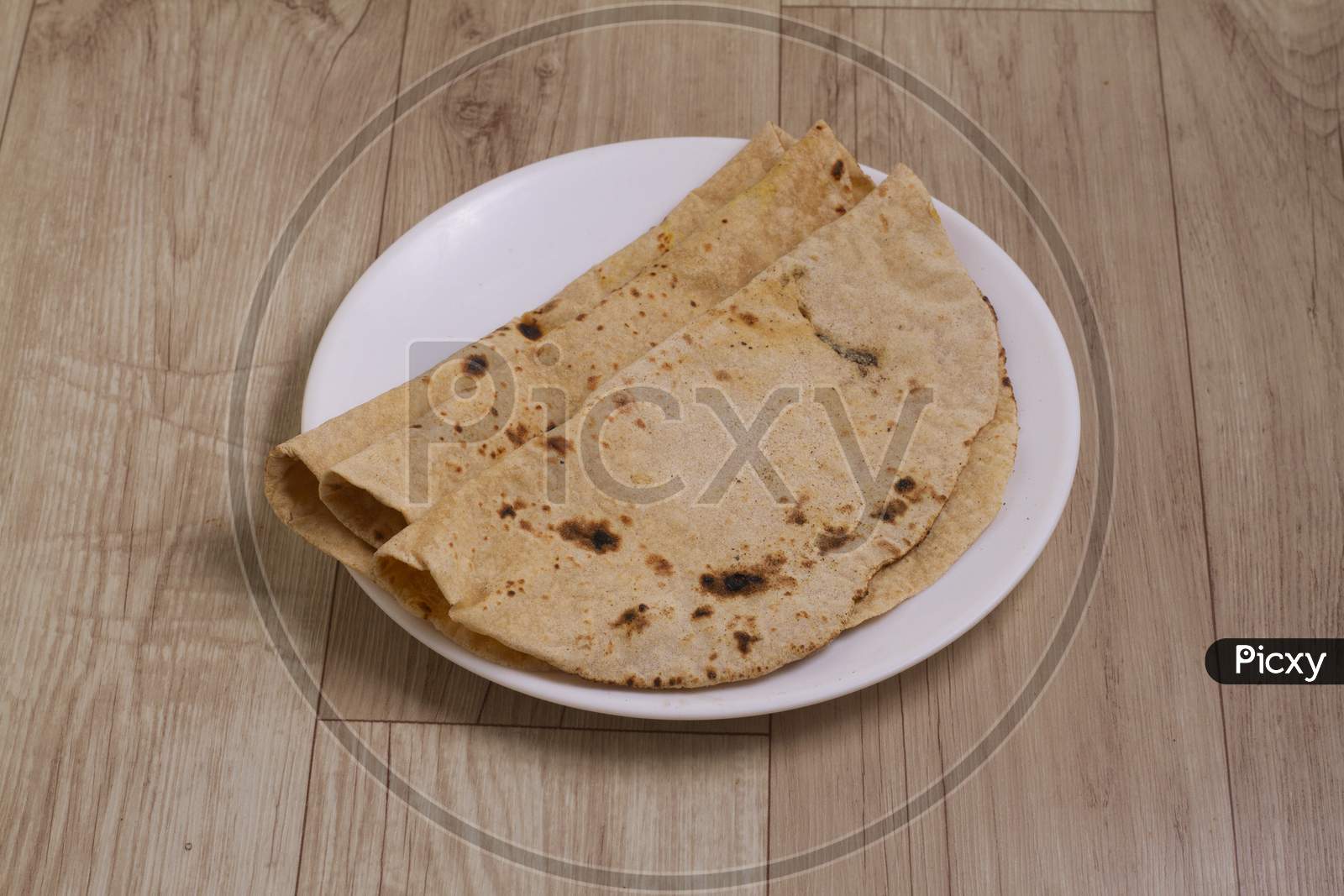 Indian Traditional Cuisine Chapati, Roti, Fulka, Indian Bread, Flatbread, Whole Wheat Flat Bread, Chapathi, Wheaten Flat Bread, Chapatti, Or Chappathi