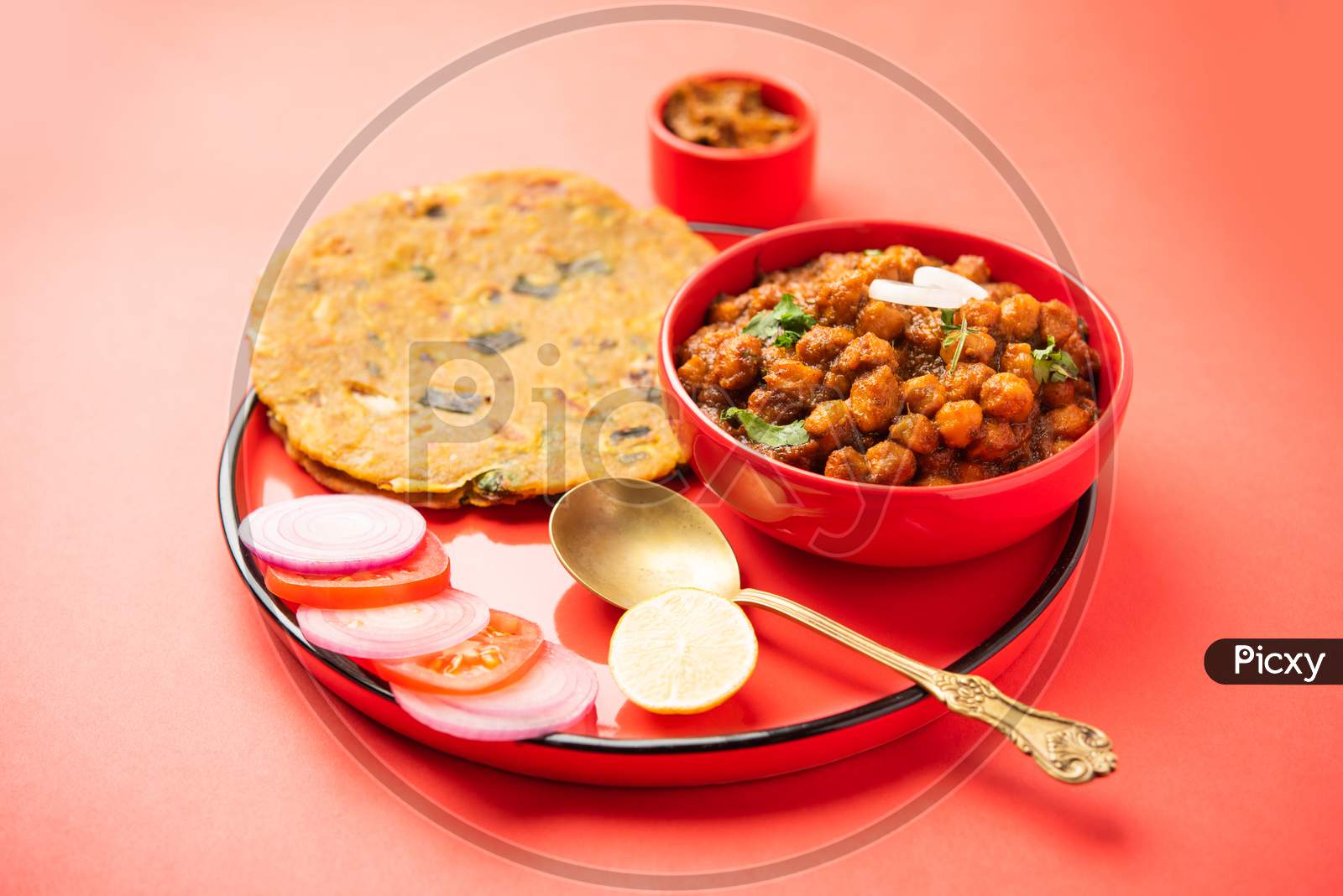 Onion Paratha With Chole Masala Or Spicy Chickpea