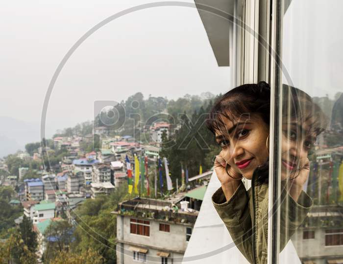 A Young Female Tourist Enjoying The View Of Beautiful Gangtok The Capital City Of Sikkim