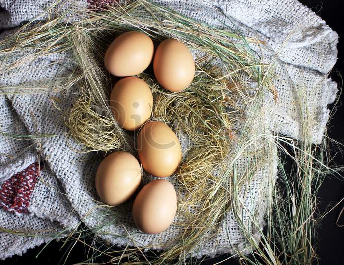 The Eggs Closeup Picture On The Burlap Cloth Stock Photo