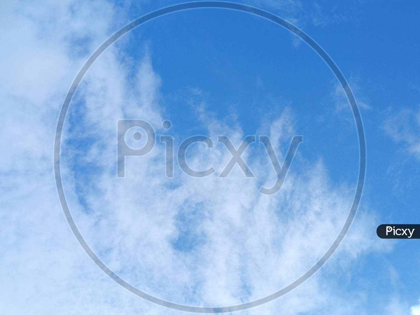 Sunny Day In Blue Sky With Nice White Clouds