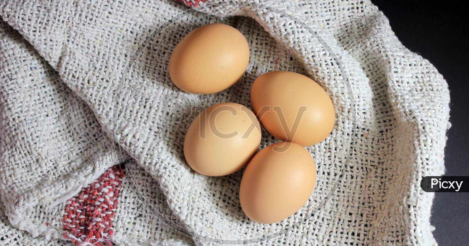 Brown Eggs On The Coir Mat