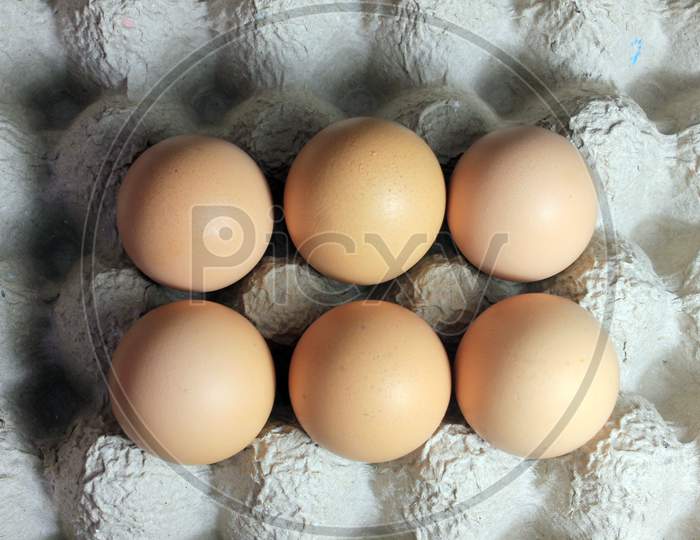 Brown Eggs On The Carton Stock Photo