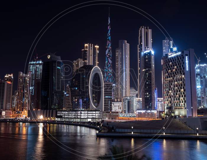 March 5Th,2021, Dubai,Uae. Beautiful View Of The Illuminated Sky Scrappers Along With Burj Khalifa Captured From The Marasi Drive At The Business Bay District, Dubai, Uae.