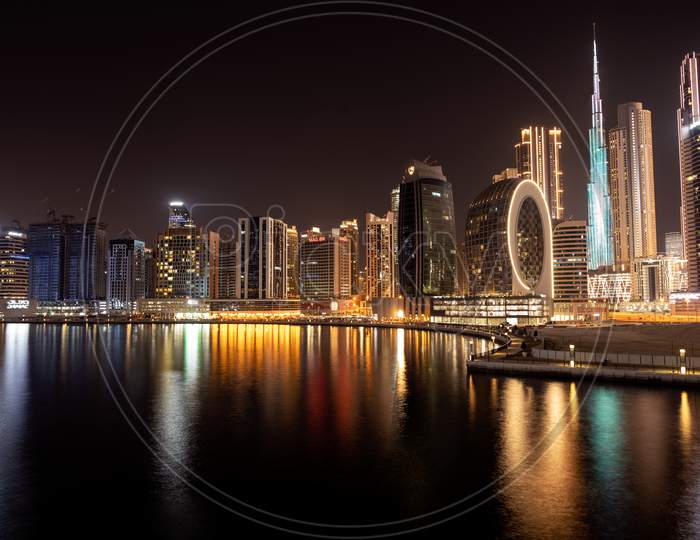 March 5Th,2021, Dubai,Uae. Beautiful View Of The Illuminated Sky Scrapers Along With Burj Khalifa Captured From The Marasi Drive At The Business Bay District, Dubai, Uae.