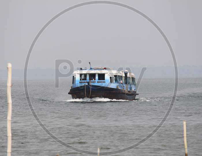 Passenger boat travelling through Vembanad lake, Kumarakom
