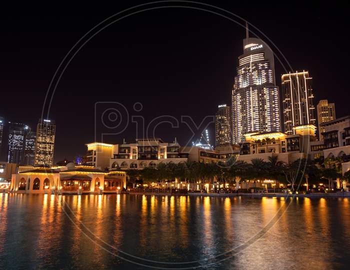 7Th Jan 2021,Dubai,Uae . Beautiful View Of The Illuminated Souk Al Bahar ,The Dubai Mall, Hotels And Other Buildings Captured At The Recreational Boulevard Area Of The Burj Park , Dubai,Uae.