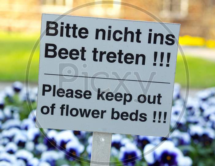 Keep Out Of Flower Beds Sign