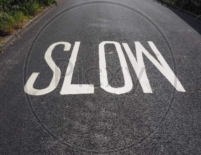 Slow Sign On Street