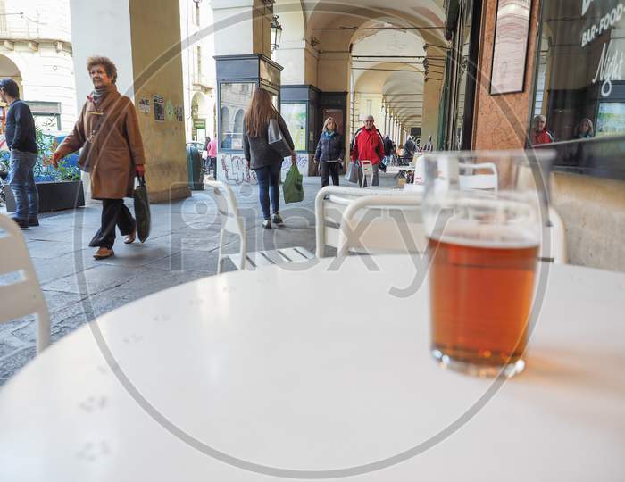 Turin, Italy - October 22, 2014: Pint Of British Ale On A Pub Table - Selective Focus On People