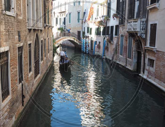 Venice, Italy - Circa September 2016: Gondola Traditional Flat Bottomed Rowing Boat In The Venetian Lagoon